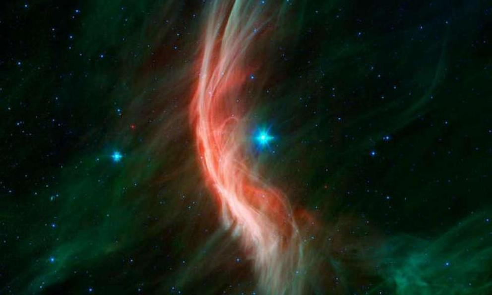 The bow shock of Zeta Ophiuchi, another runaway star observed by Spitzer.