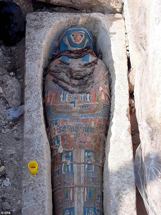 The Egyptian archaeological expedition was unearthing the southeast corner of the pyramid of King Amenhoth II when they uncovered the remains