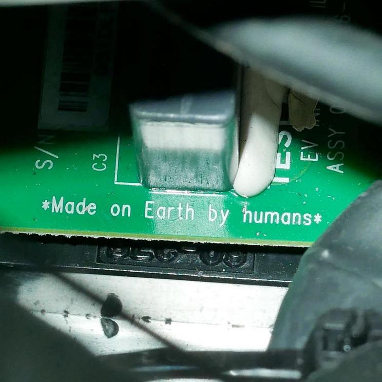 SpaceX etched this note on a circuit board inside the Roadster, just in case any aliens, or far-future humans, stumble onto the car.