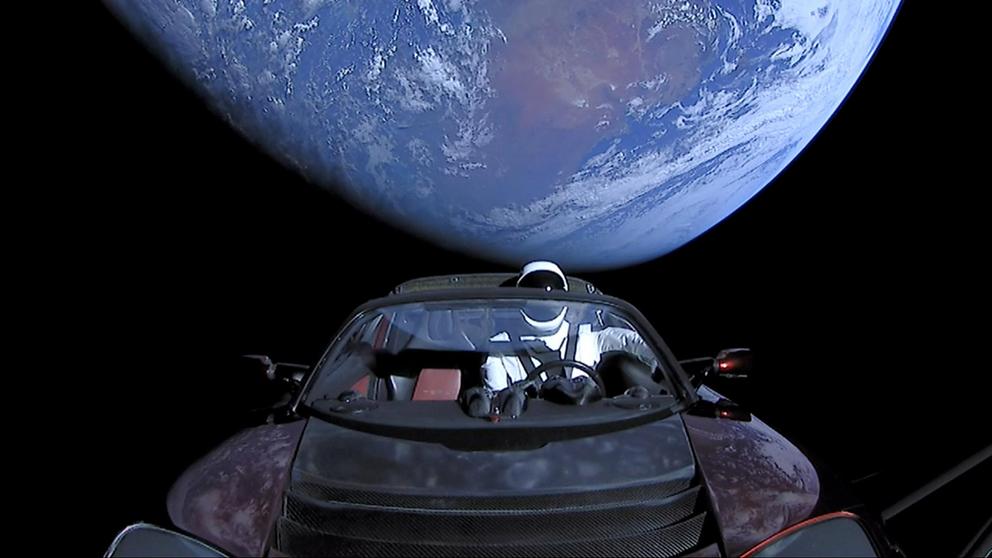 The Roadster leaves Earth in the rear-view mirror.