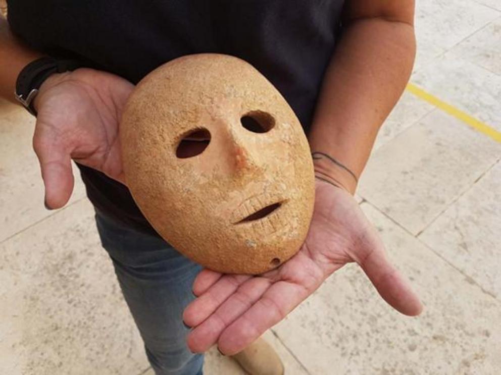 The mask dates to the Neolithic period, 9,000 years ago.