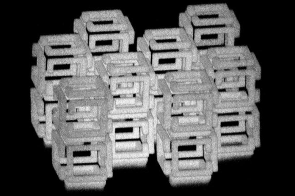 MIT engineers have devised a way to create 3-D nanoscale objects by patterning a larger structure with a laser and then shrinking it. This image shows a complex structure prior to shrinking.  Credit: Daniel Oran