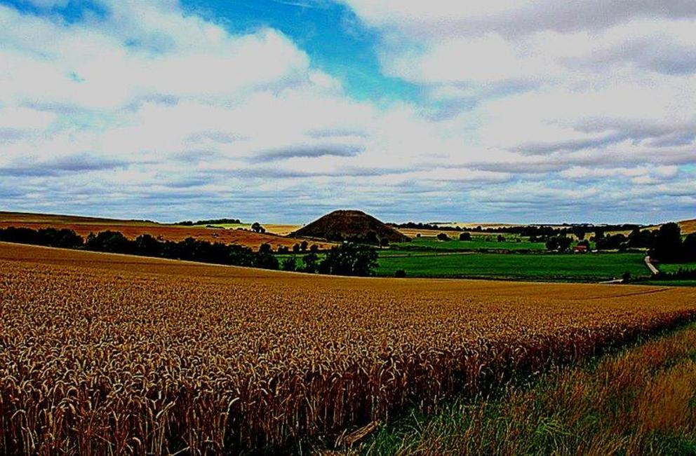 The view from West Kennet long barrow, looking towards Silbury Hill and the ancient village of Avebury.