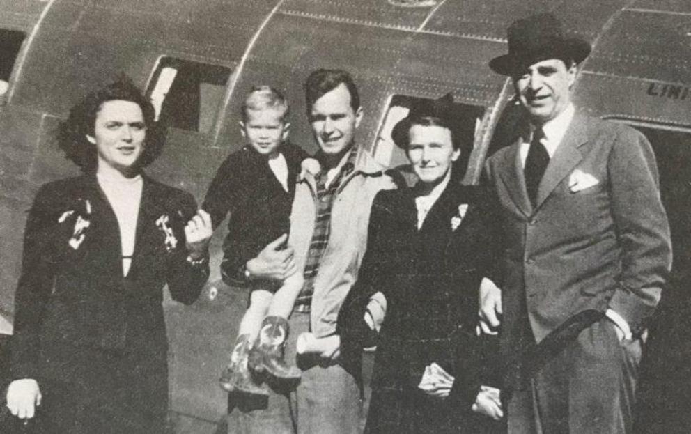 Three generations of Bushes in front of a Dresser aircraft