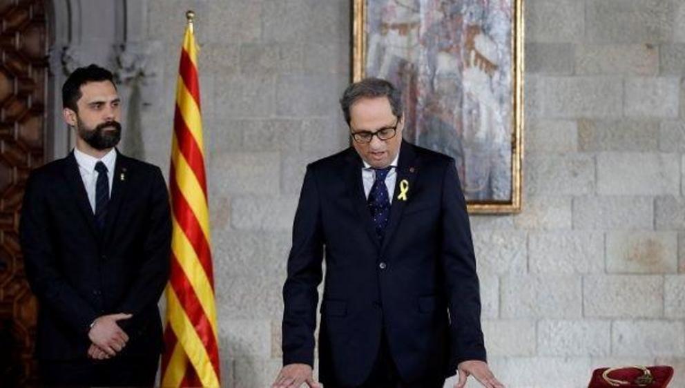 Quim Torra takes his oath as new Catalan Regional President during a ceremony at Generalitat Palace in Barcelona, Spain, May 17, 2018. | Photo: Reuters
