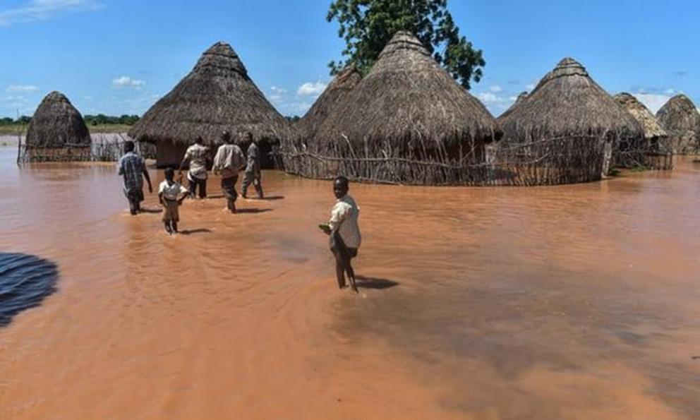 Floodwaters in the coastal Tana Delta region of Kenya. Torrential rains have caused severe flooding across 32 of the country’s 47 counties. Photograph: Andrew Kasuku/AFP/Getty Images 