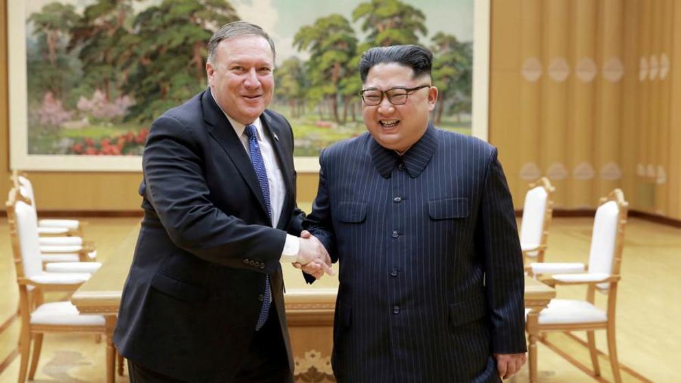 FILE PHOTO: North Korean leader Kim Jong Un shakes hands with US Secretary of State Mike Pompeo © KCNA / Reuters 