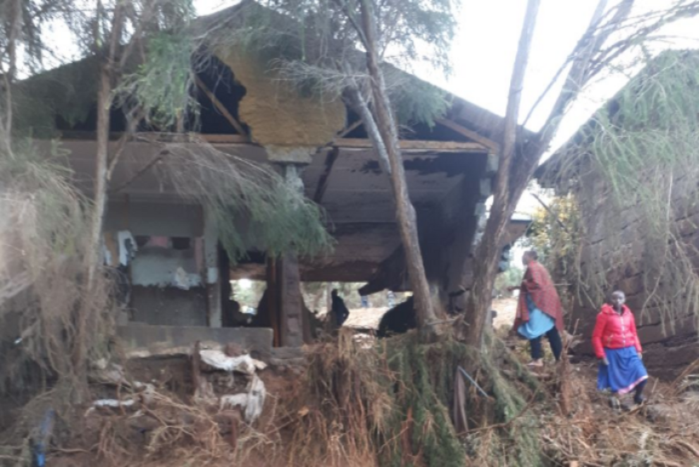 Families searched the ruins of their homes the morning after the dam broke.