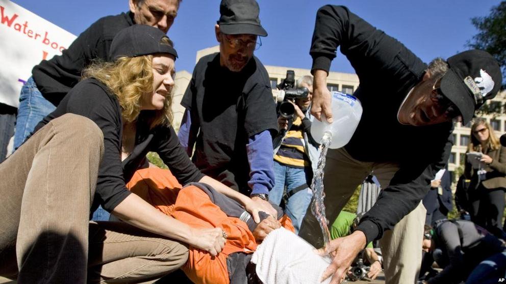FILE PHOTO: Waterboarding protest © Kevin Lamarque / Reuters