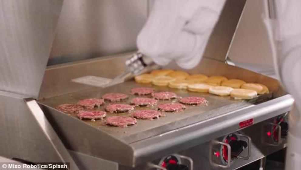 The one-armed robot chef has been re-tooled and is now flipping 300 burgers a day, seven days a week at Caliburger in Pasadena, California 