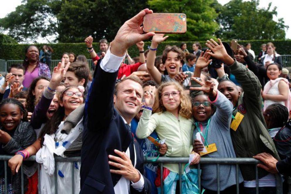 Photo: Young people have criticised Mr Macron's plan for compulsory national service, saying they should have freedom of choice. (AP-Pool: Charles Platiau) 