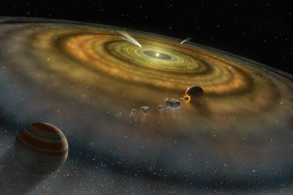 Dust and gas form moons and planets in a newborn solar system. 