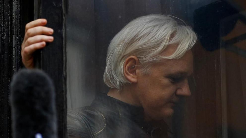 WikiLeaks founder Julian Assange on the balcony of the Ecuadorian Embassy in London. © Peter Nicholls / Reuters