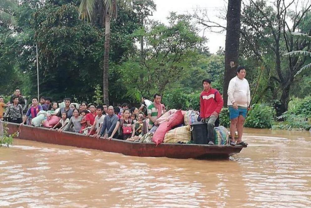 Volunteers helped evacuate stranded people to higher ground. 