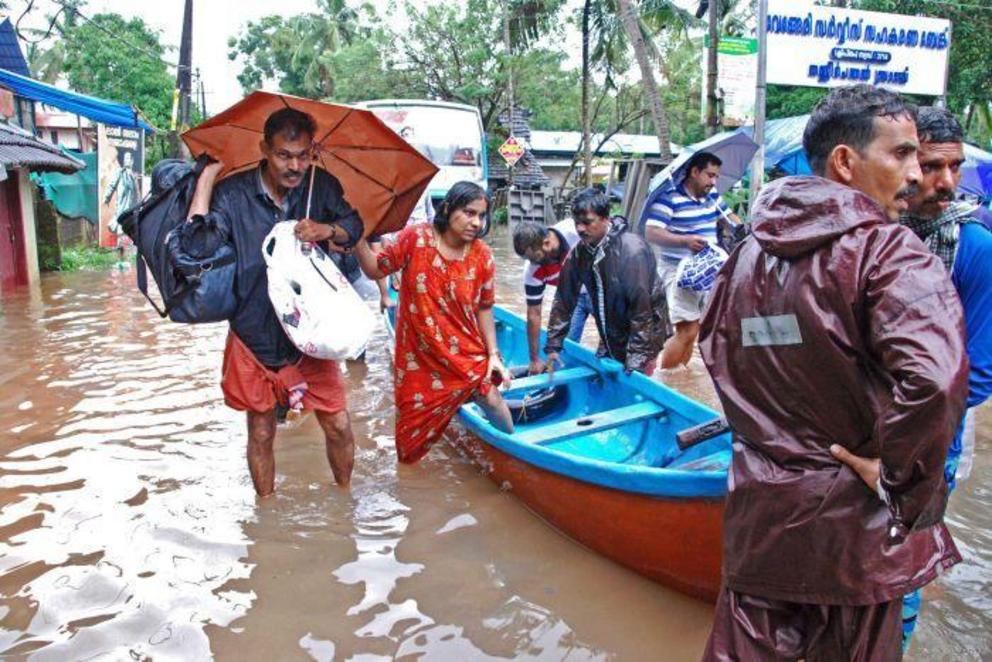 Flood victims are evacuated to safer areas in Kozhikode, in the southern Indian state of Kerala.