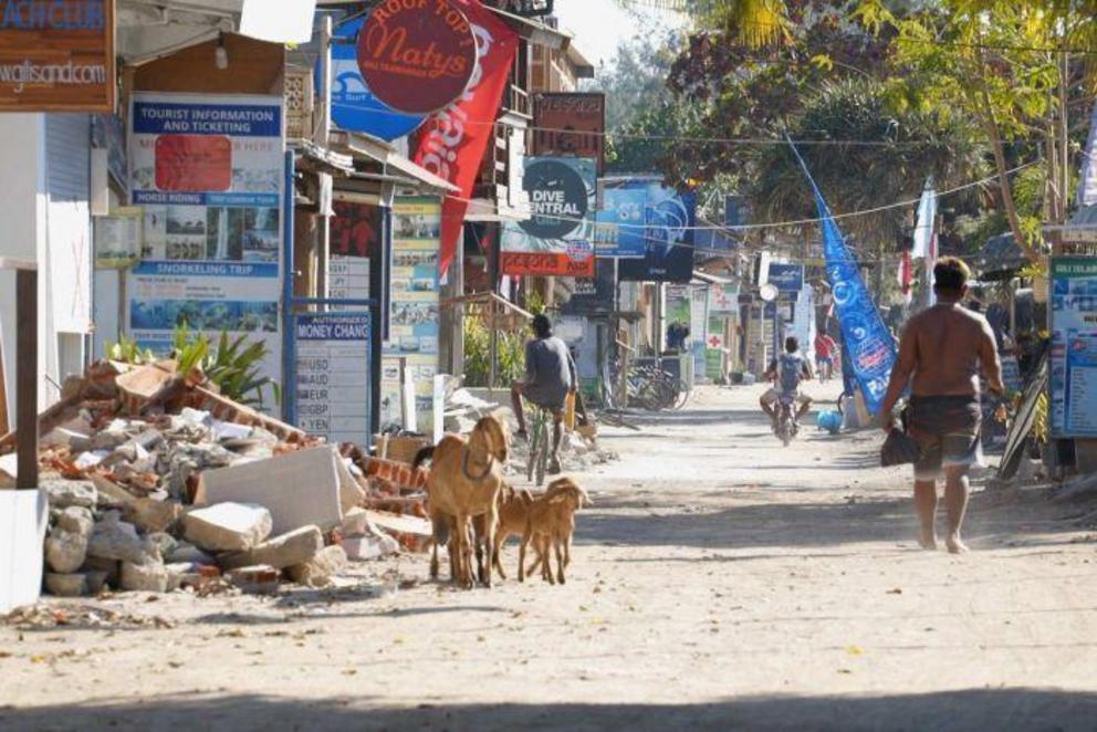 Thousands of Indonesian police and military personnel are working to repair critical infrastructure. 