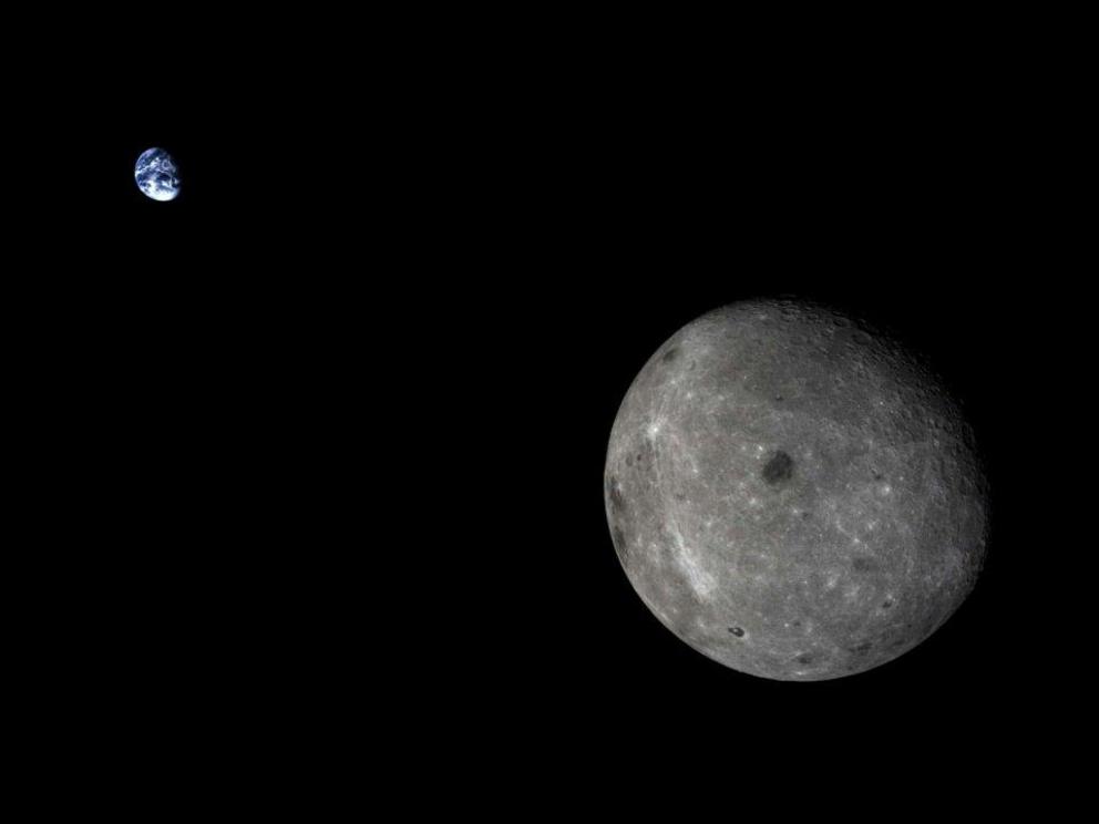 A photo of Earth and the moon's far side.