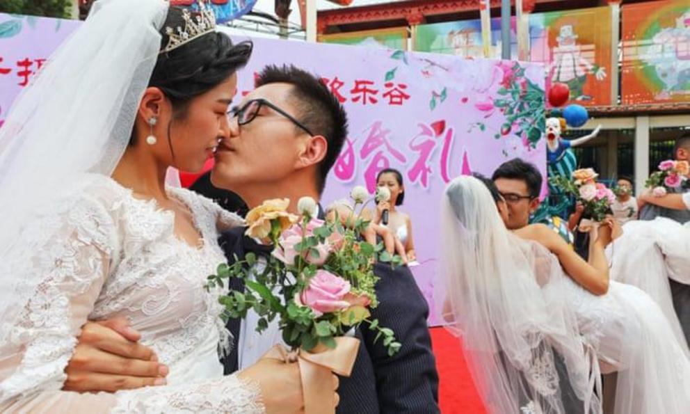 A group wedding in Shanghai, China. These couples may have a future free of family planning restrictions.