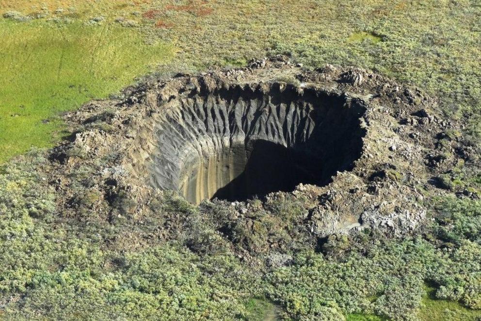 An aerial view of a crater which jas already blown on the Yamal Peninsula, northern Siberia