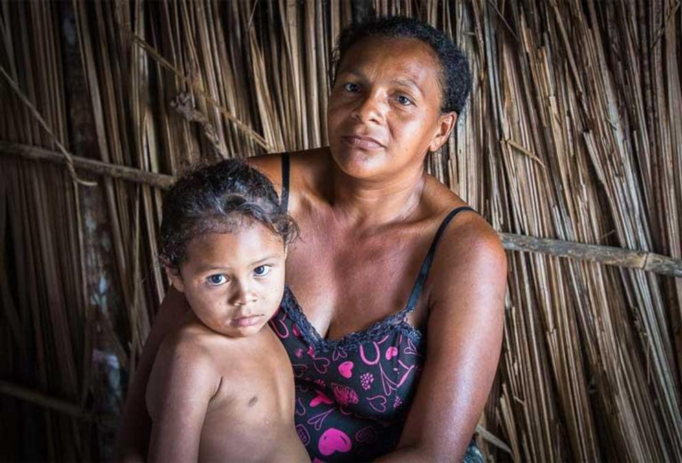 Franciana Rodrigues de Araus, 30, mother of 7 children, with another on the way. She became critically ill in April after pesticides rained down on her from a plane spraying neighboring soy fields.