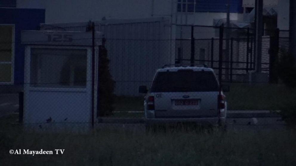 A diplomatic car with US Embassy registration plates can be seen in the car park of the Lugar Center at night when the laboratory is seemingly still working.