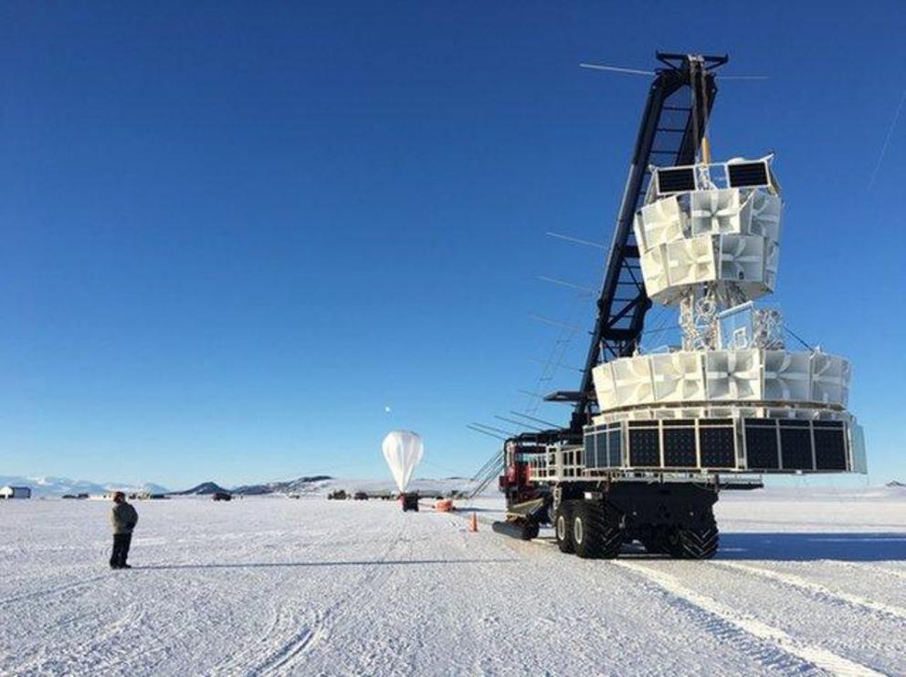 A team prepares ANITA for flight over the Antarctic ice.