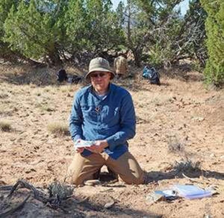 Erick Robinson, a UW postdoctoral researcher, collects a radiocarbon sample from a 1,000-year-old roasting feature in Dinosaur National Monument in Utah. Robinson is a co-author of a paper, titled “The Synchronization of Energy Consumption by Human Societ