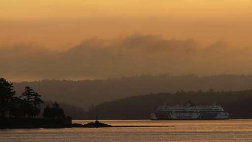 In this Sept. 25, 2018 photo, a BC Ferries boat sails near Vancouver Island, British Columbia, at sunrise. On Oct. 17, 2018, Canada will become the second and largest country with a legal national marijuana marketplace, a social-policy shift promised by C