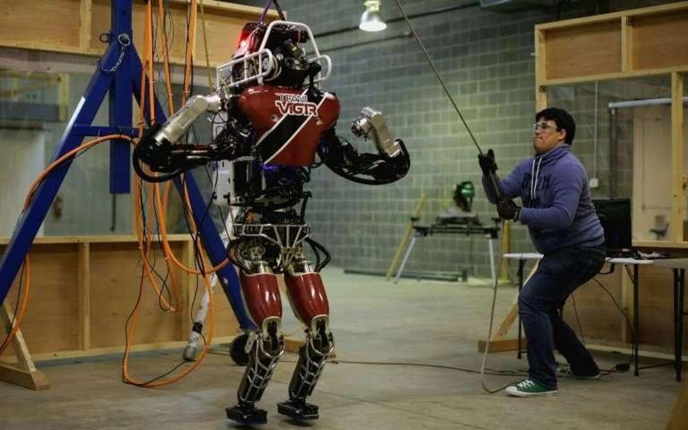Atlas, a humanoid robot made by Boston Dynamics, can run on different types of surfaces