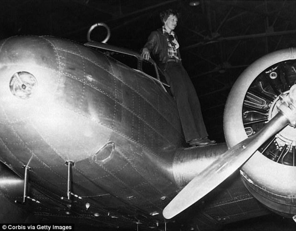 Heartbreaking distress calls were picked up around the world by naval stations actively participating in the search, and casual listeners in their homes. Above, Earhart is seen on the wing of her plane before her last flight in 1937