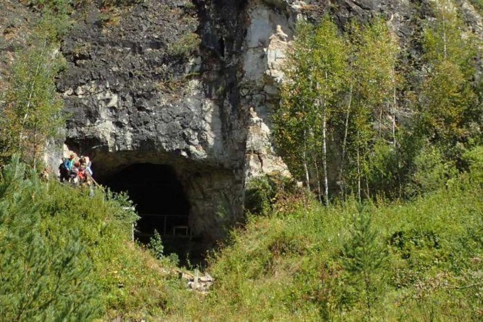 The entrance to Denisova Cave in the Altai mountains of Siberia.