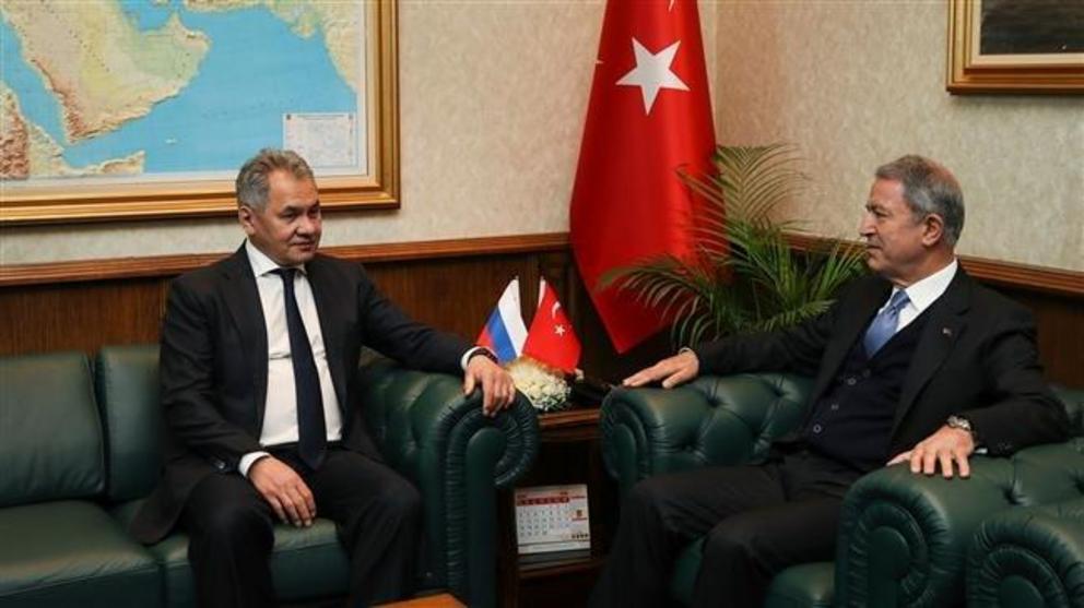 This handout picture, released by the Turkish Defense Ministry on February 11, 2019, shows Russian Defense Minister Sergei Shoygu (L) during a meeting with Turkish Defense Minister Hulusi Akar in Ankara, Turkey. (Via AFP)