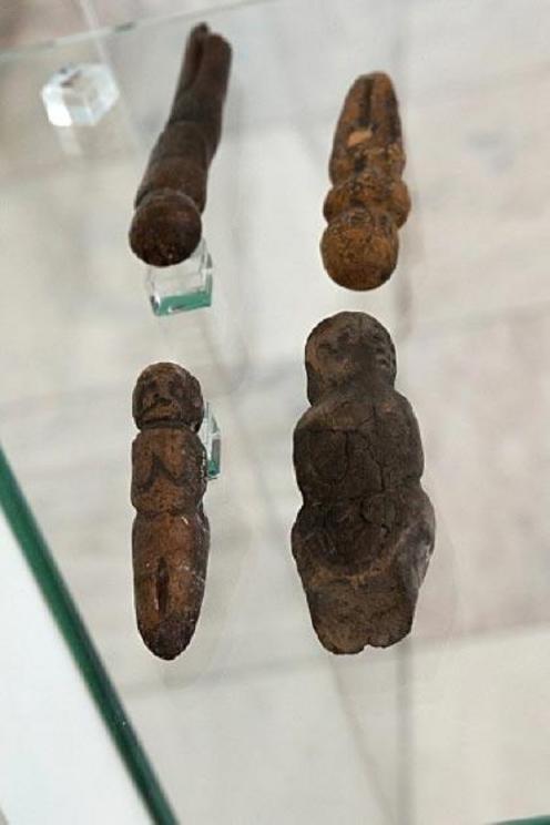 Art objects made of mammoth ivory from the 24,000-year-old Mal’ta site in southern central Siberia. 