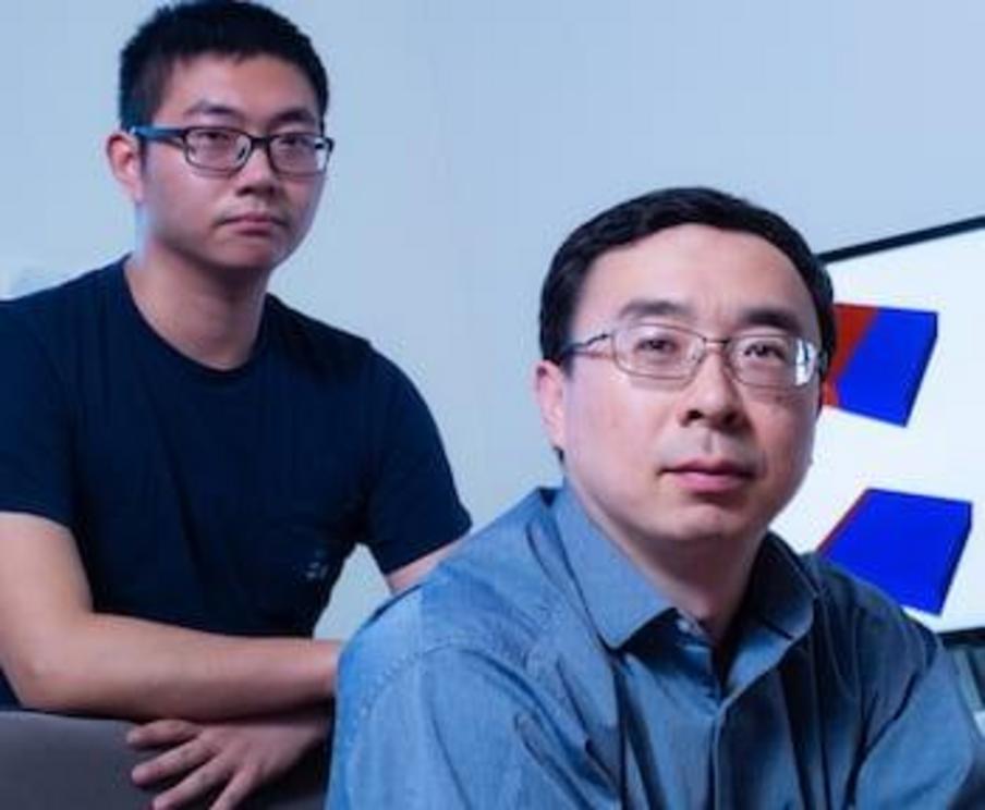 Rice graduate student Kaiqi Yang, left, and materials scientist Ming Tang modeled how engineering defects in the atomic lattice of an iron phosphate cathode can improve the performance of lithium ion batteries. Photo by Jeff Fitlow