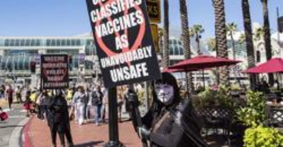 Anti-vaccine protesters demonstrate outside Comic-Con on July 20, 2019 in San Diego.Daniel Knighton / Getty Images file
