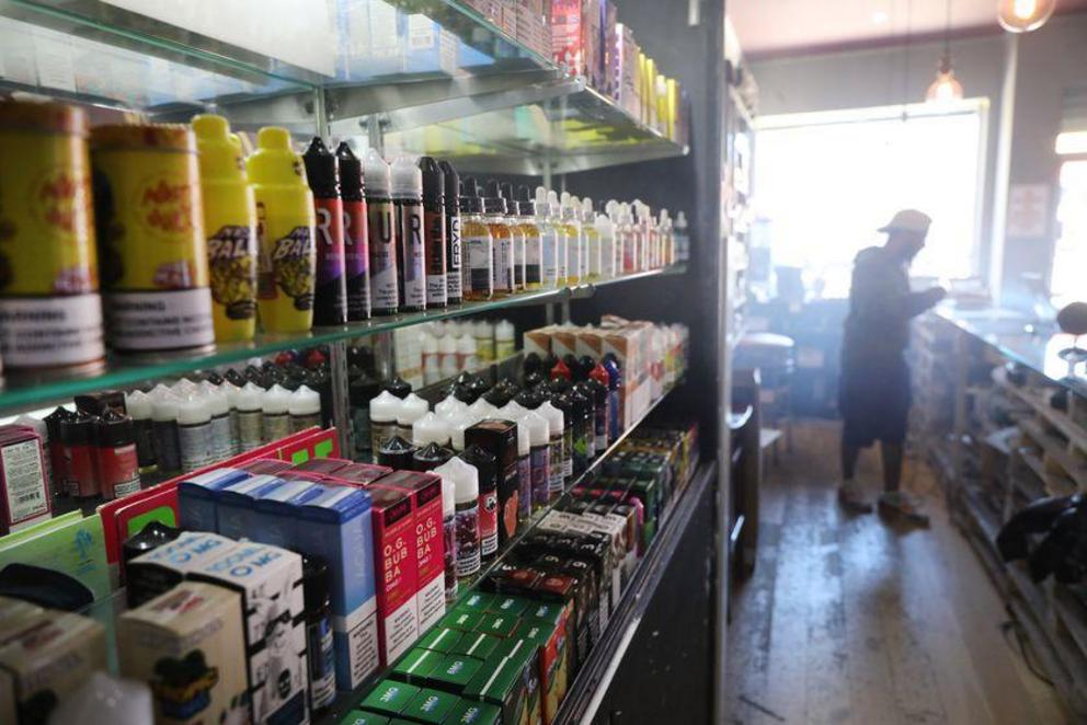A vaping shop in Queens, a borough of New York City, features a lounge area to vape and sells hundreds of different vaping products.
