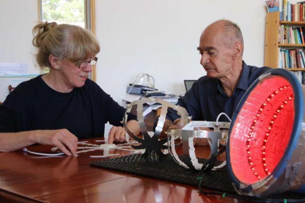 Photo: Catherine Hamilton and Ron Brown are designing the helmet for the Sydney clinical trials (ABC News: Manika Dadson) 