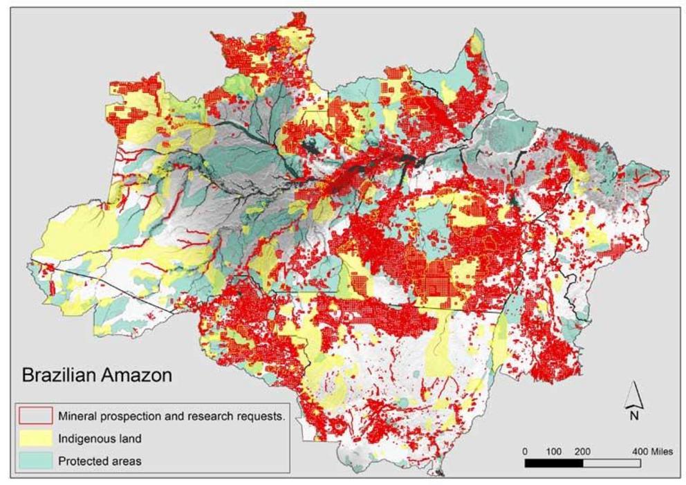 The mining industry has not only made prospecting requests (red) within indigenous reserves (yellow), but also on other conserved lands (green).