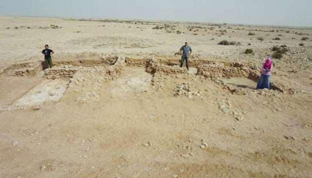 Members of the team that made the discovery are seen at the site