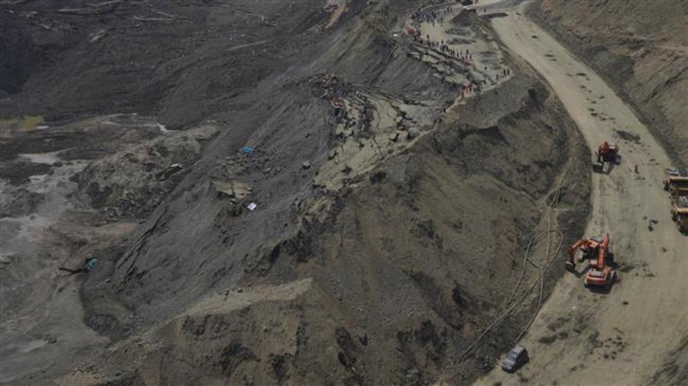 This aerial photo, taken on April 23, 2019, shows search and rescue personnel looking for miners at a jade mine following a landslide in Hpakant, Kachin State, Myanmar, on April 23, 2019.
