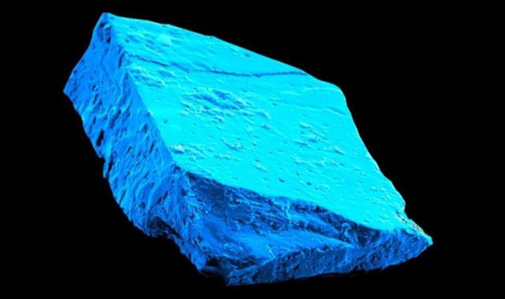 Blue hibonite crystals, the oldest minerals in our solar system, hold evidence of an active, young sun.