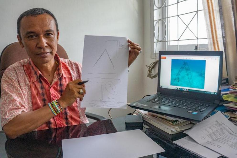 Iksam at his office at the Central Sulawesi Museum.