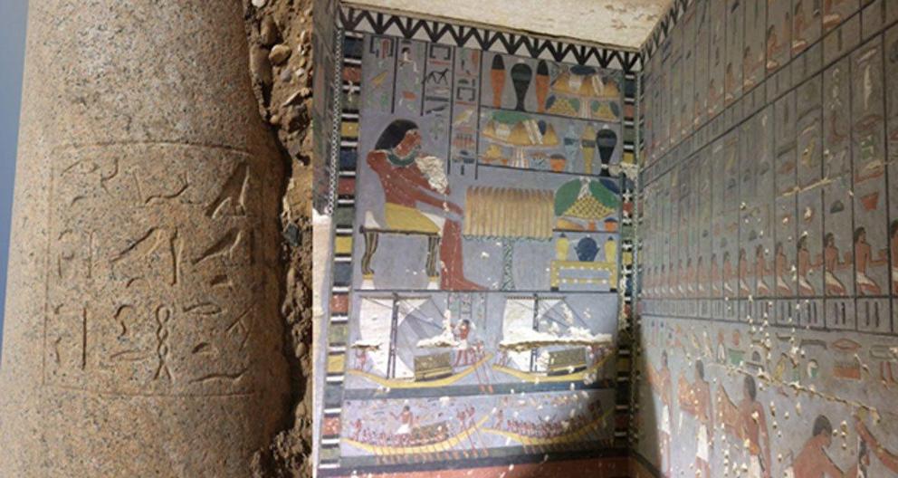 The north wall of the decorated antechamber showing Khuwy seated at an offering table.