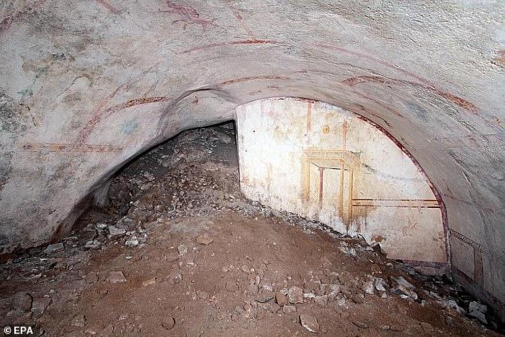 Experts chanced upon the room of the 'Golden House' which is currently half exposed, with the bottom section still buried underneath two millennia of sediment (pictured).