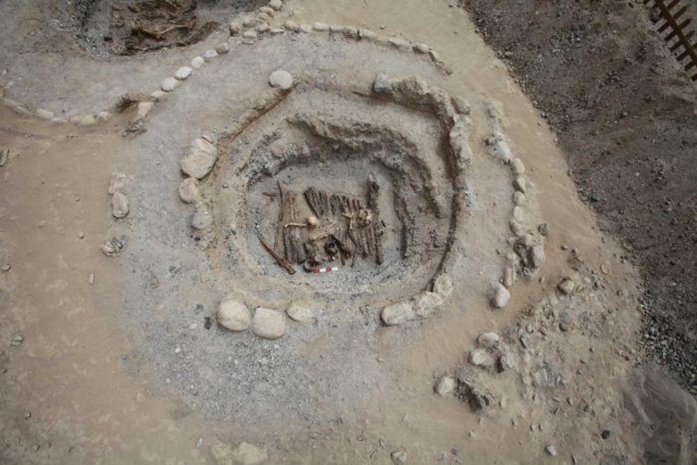  Burning cannabis inside a tomb like the one excavated here, must have produced smoke and psychoactive effects on those present in the enclosed space, the researchers said. (Supplied: Xinhua Wu)