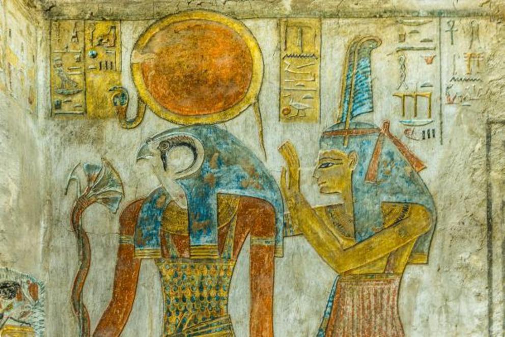 Ancient painting of the Egyptian god Ra and Maat with an ostrich feather in her headdress