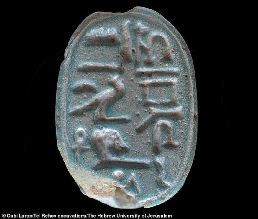 This scarab has a hieroglyphic inscription on it saying that it was made for a deceased man named 'Amenemhat.' It was found within a large building at Rehob