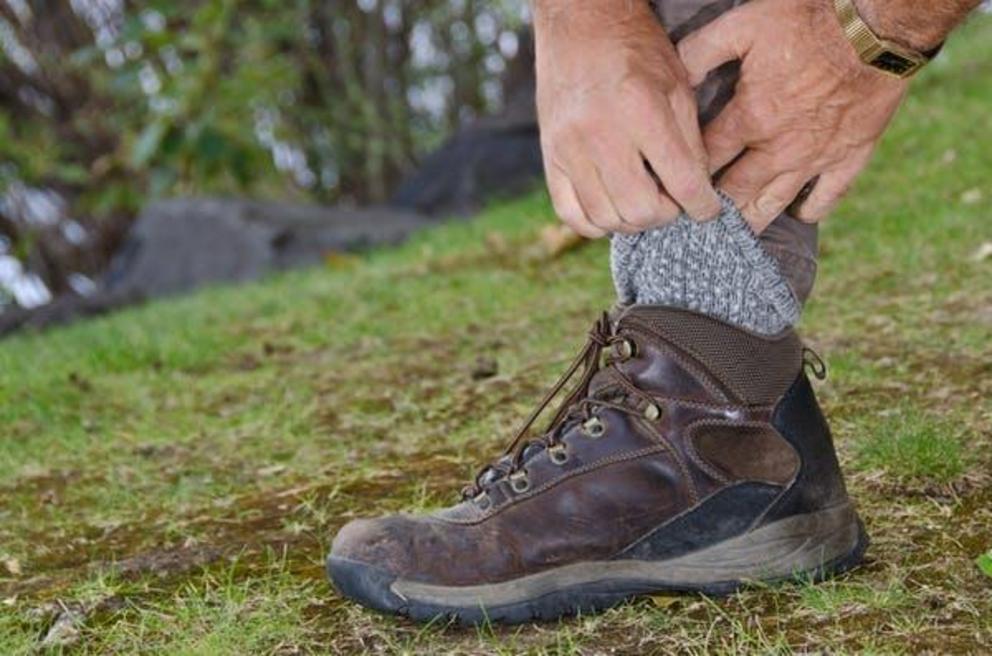  Take precautions, like tucking pants into socks, when you’re in tick territory.