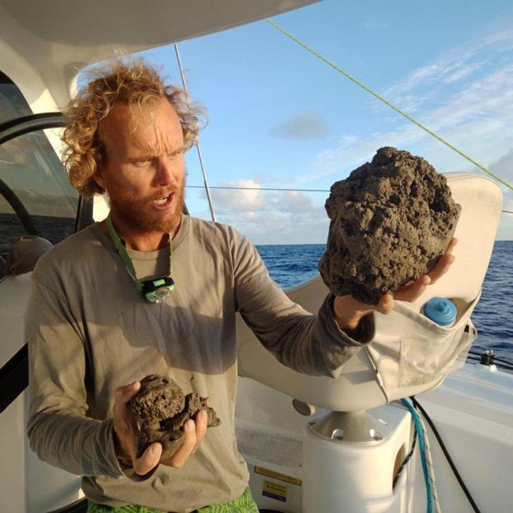 ROAM sailor Michael Hoult with pumice samples