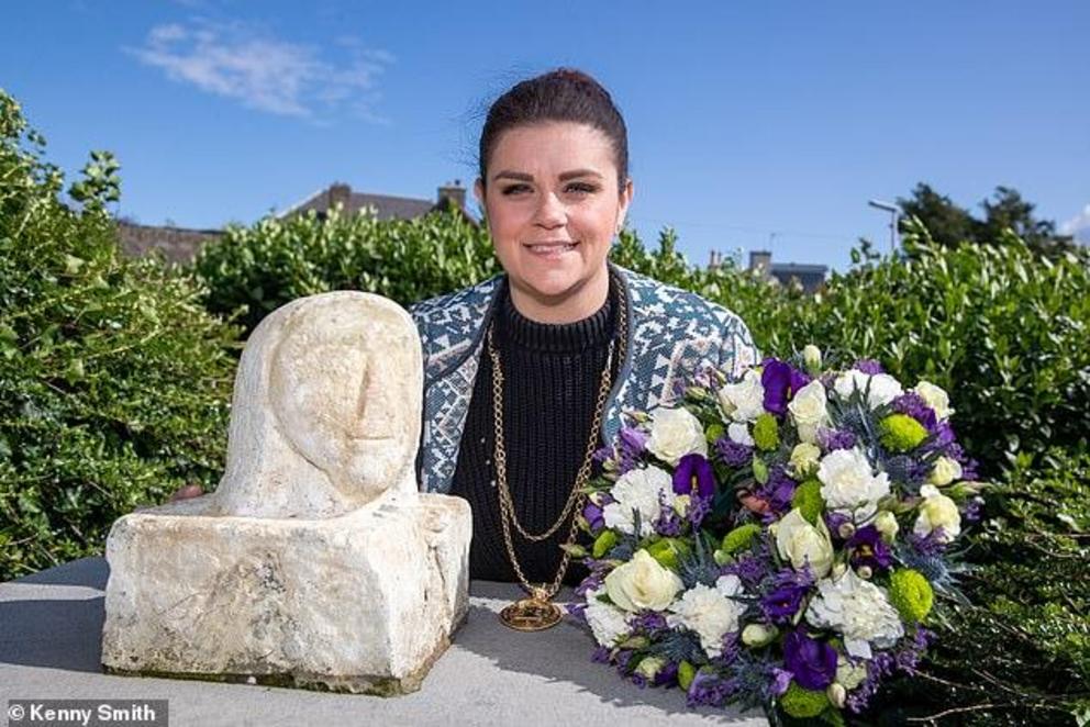 During the remembrance, Fife depute provost Julie Ford, pictured laid a wreath at Ms Adie's grave, which is marked by a stone slab lying in the coastal mud at the Torry Bay Nature Reserve